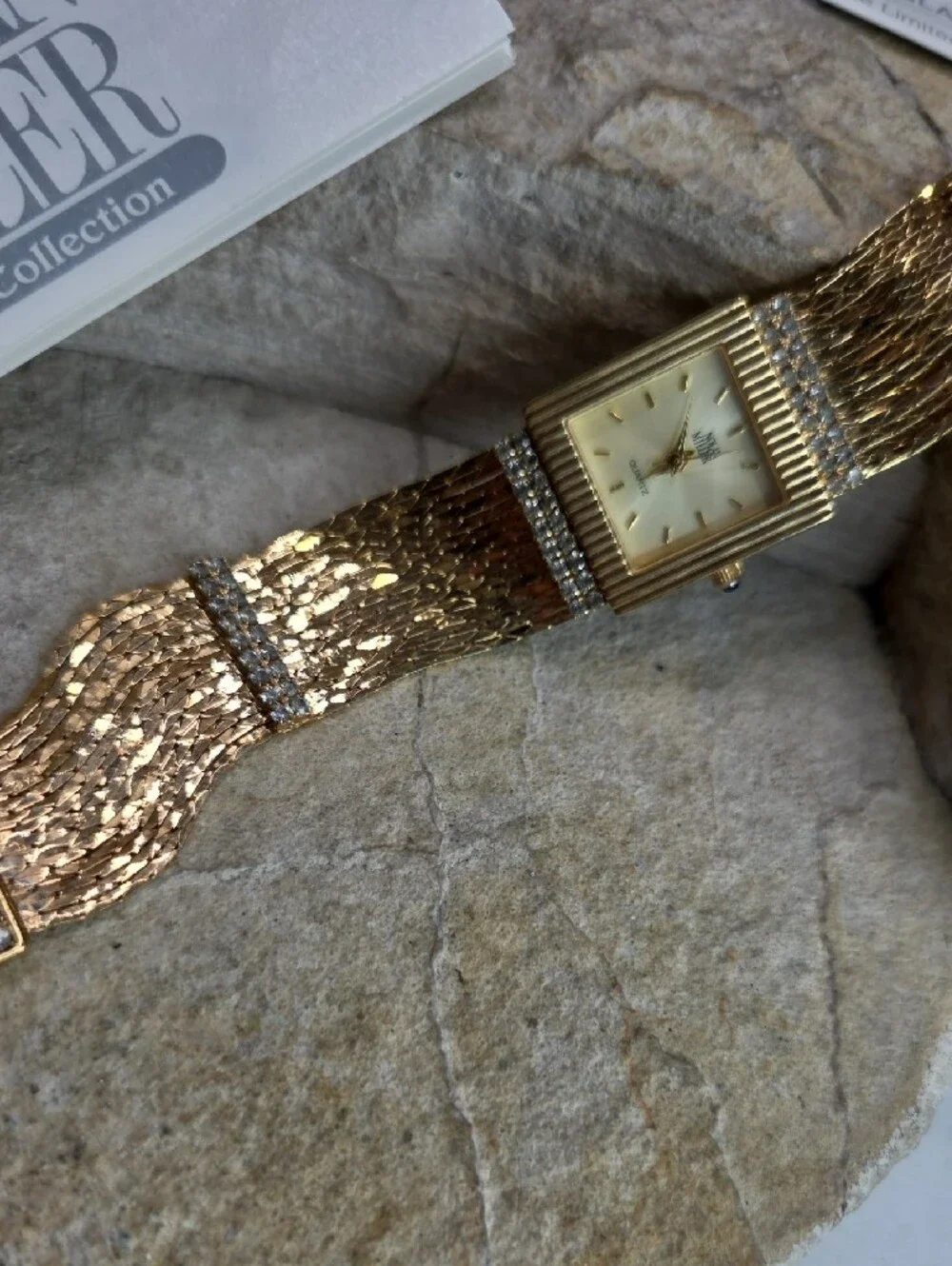 Nolan Miller Gold Chain Bracelet Watch  Rhinestone Accents Blue Sapphire Crown